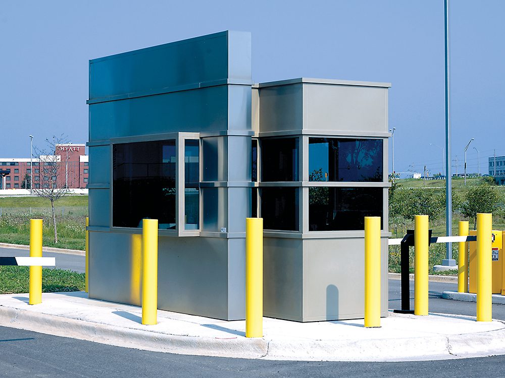 Gray, steel bi-level security booth