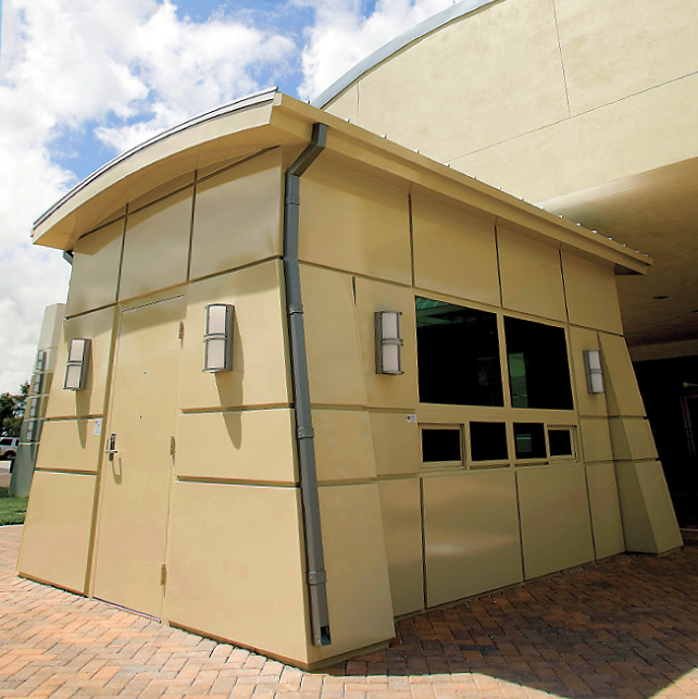 Tan guard booth with slightly rounded roof